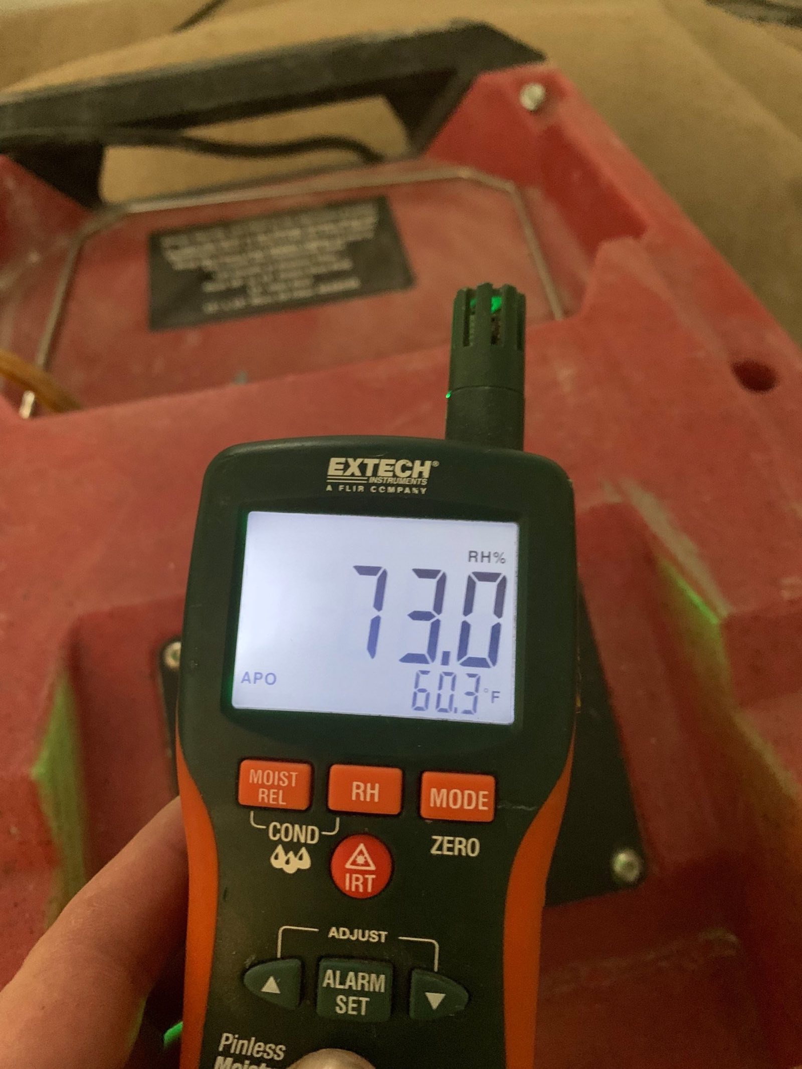 Home exterior in winter with snow on the roof