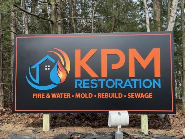 KPM Restoration headquarters sign